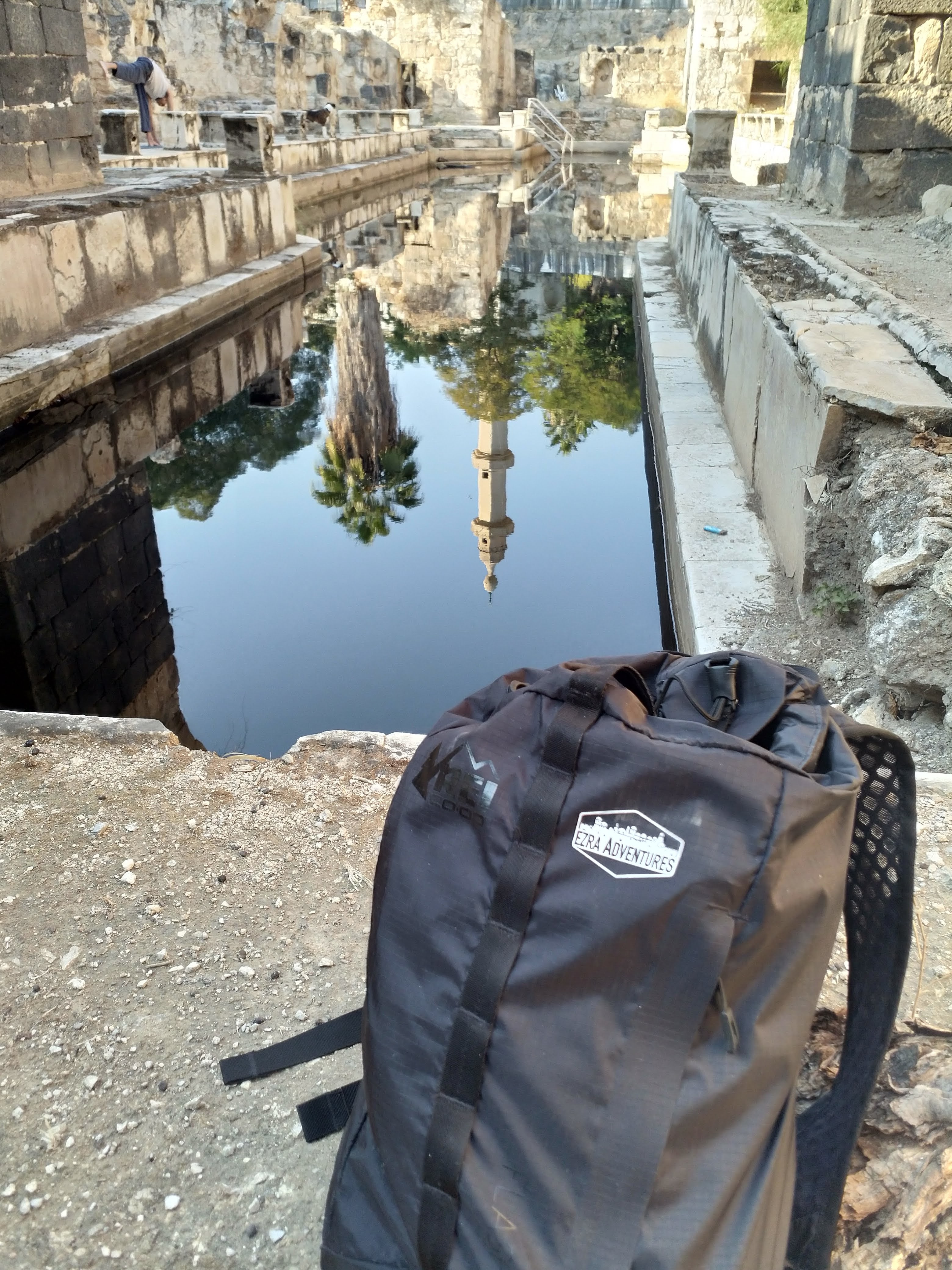 Ezra Adventures Backpack Near Pool of Water in Israel