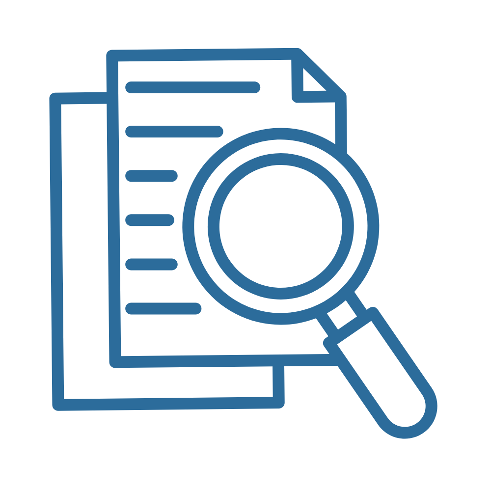 Magnifying Glass Honing in on a Piece of Paper